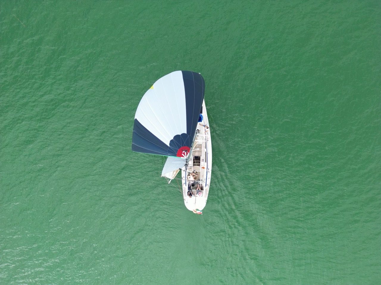 Jackpot under spinnaker, seen from above by drone