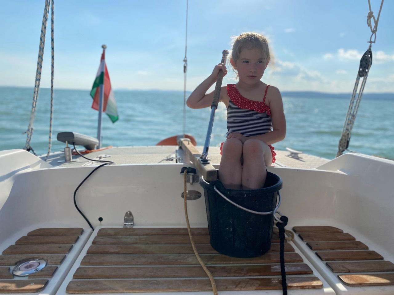 Young guest aboard Jackpot on a sunny day